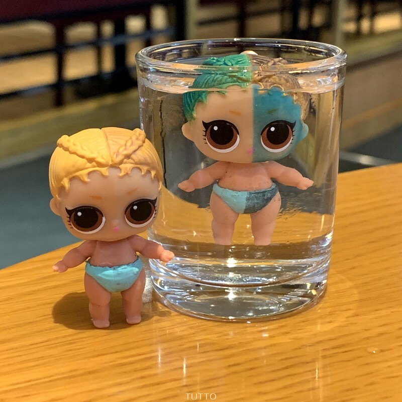 kicks the lol doll